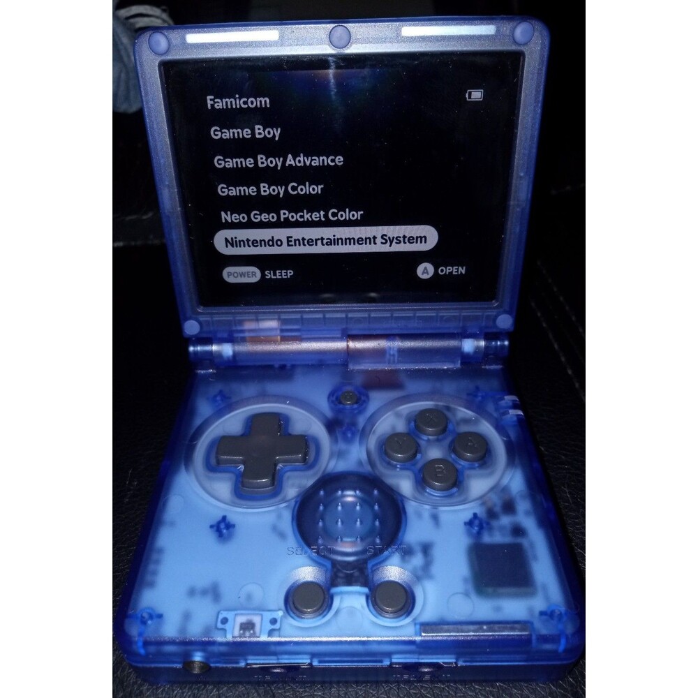 Anbernic Rg35xxsp transparent blue handheld
